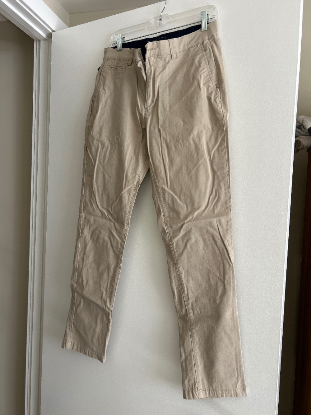 Men’s tan stretch chinos.